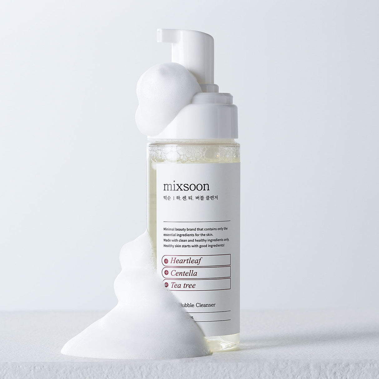 Flacone del detergente Mixsoon H.C.T. Bubble Cleanser con erogatore e schiuma bianca