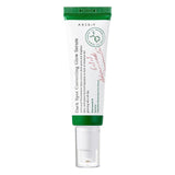 Tubo verticale di siero AXIS-Y Dark Spot Correcting Glow Serum da 50 ml con tappo trasparente e scritte verdi e rosse, su sfondo bianco neutro.