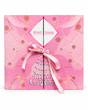 Calendario dell'avvento skincare coreana in scatola regalo rosa chiusa con fiocco di raso e scritta Merry Christmas