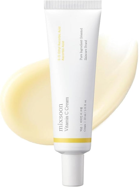 Mixsoon Vitamin C Cream crema viso illuminante alla vitamina C con texture gialla su sfondo skincare coreana
