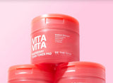 Barattoli di Vita Vita Raspberry PDRN Toner Pad Be The Skin su sfondo rosa